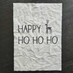 Canvas Print in schwarz weiß mit dem Aufdruck "Happy Ho Ho Ho"