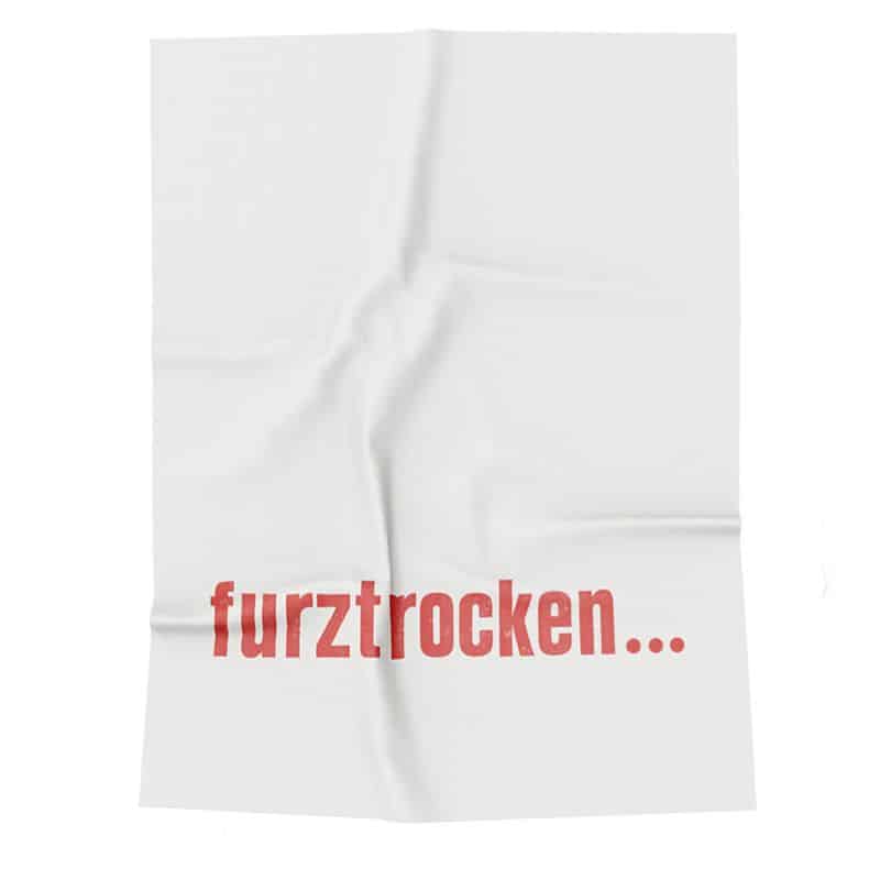 Geschirrtuch mit der Aufschrift "furztrocken"